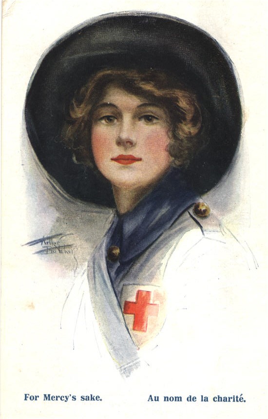 A White female Red Cross nurse in blue wearing a wide brimmed hat looking at the viewer.
