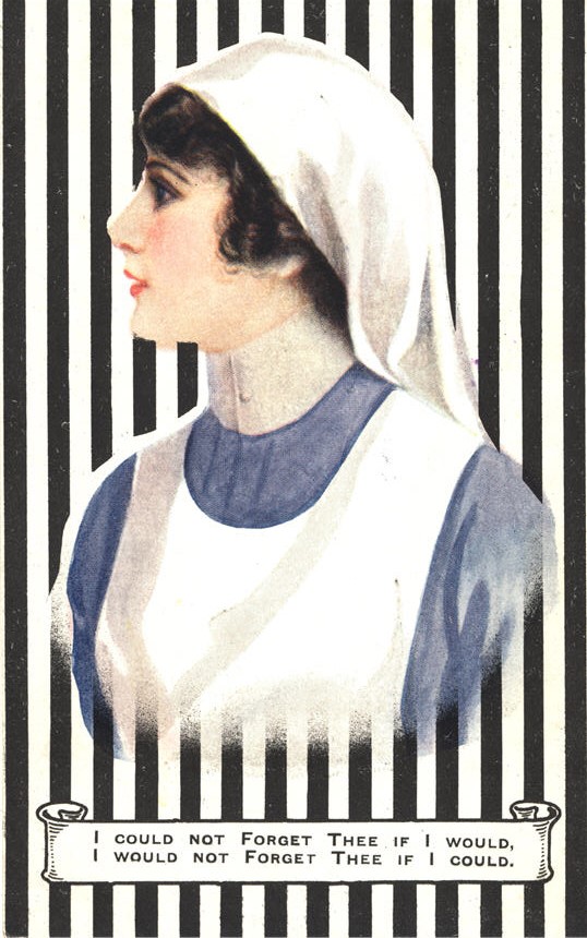 A White female nurse in blue and white, visible from the chest up, looking to the left.