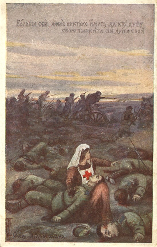 A White female nurse in brown uniform, kneeling beside a White male soldier on the battlefield.
