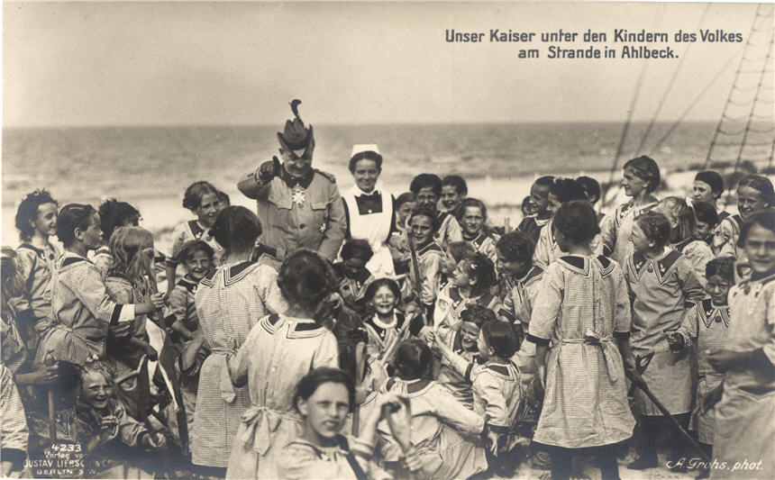 The Kaiser surrounded my young White girls. A White female nurse stands next to the Kaiser.