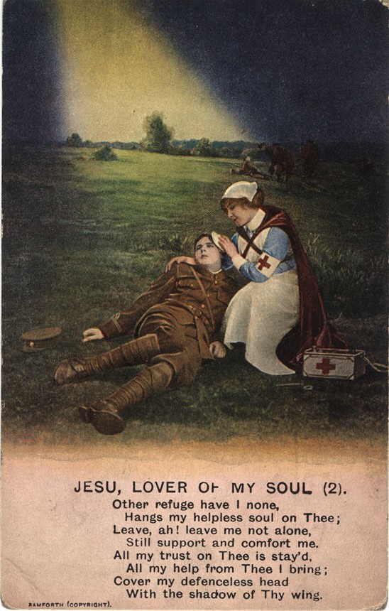A White female nurse in blue and white tending to a wounded White male soldier on the battlefield.