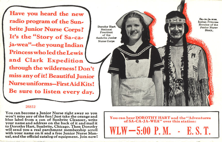 Two White girls standing, one dressed as nurse, the other as Native American.