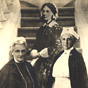 Three White women stand in front of a staircase, all three are cutouts from other photographs.