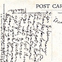 Back of postcard has two sections, handwritten note and address ocuppy both sections.