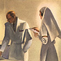 A White male doctor and female nurse standing at the bedside of a White patient.