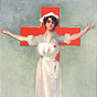 White female Red Cross nurse standing with arms open, looking at viewer.