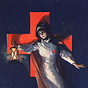 A White female nurse holding out a lamp with her right arm, in Front: of the Red Cross symbol.