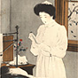 Asian nurse preparing a syringe next to the bed of a patient under blankets.