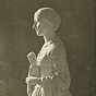 A marble statue of a White woman (Florence Nightingale), she is facing left.