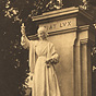 Statue of a White woman (Florence Nightingale) holding a lamp.