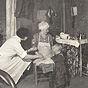 A White female nurse in white squats down while talking with a White mother and child.