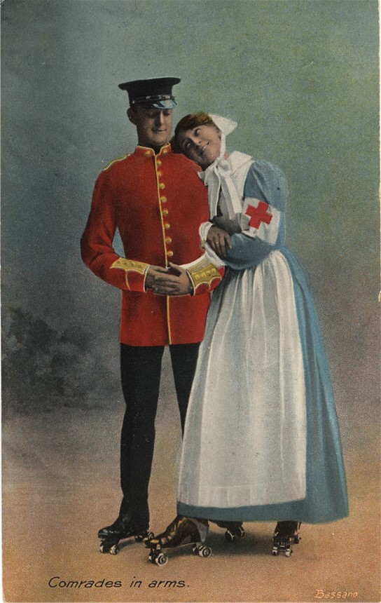 A White female nurse leaning her head on a White male soldier's shoulder. 