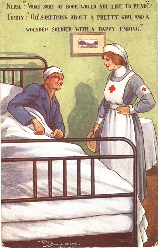 A White female nurse standing next to a White male wounded soldier propped up in bed and smiling.