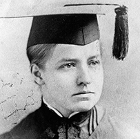 Dr. Alice Bennett, a posing in a graduation cap and gown. Inscription reads: F. Gutekunst Philadelphia.