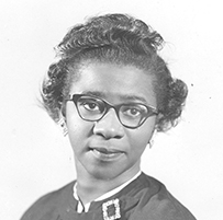 Dr. Clara Arena Brawner, an African American female in formal attire posing for her portrait.