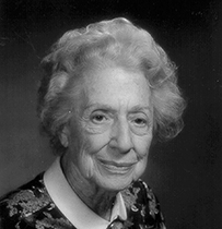 Dr. Alice Ettinger, an elderly White female with short hair posing for her portrait.