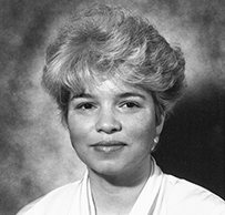 Dr. Virginia Davis Floyd, a female with short hair posing for her portrait.