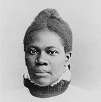 Dr. Eliza Ann Grier, an African American female in a collared blouse posing for her portrait.