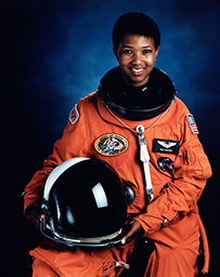 Dr. Mae C. Jemison, an African American female in a NASA astronaut suit posing for her portrait.