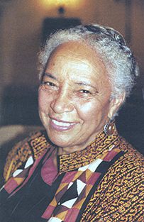 Dr. Maragaret Morgan Lawrence, a smiling African American female in a patterned top posing for her portrait.