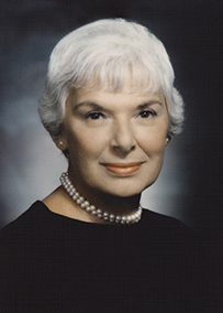Dr. Edithe J. Levit, a White female with White hair wearing pearls for her portrait.