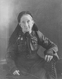 Dr. Elizabeth D. A. Magnus Cohen, a smiling White female posing for her portrait.