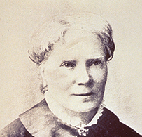 Dr. Elizabeth Blackwell, a White female in a collared blouse posing for her portrait.