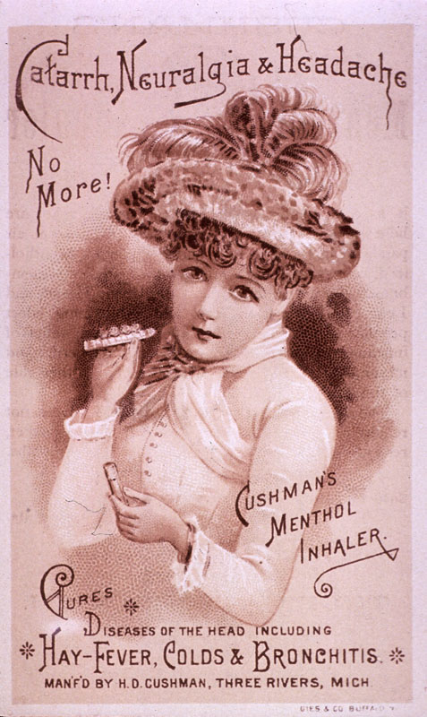 Woman, half-length, left pose, full face; holding Cushman's Menthol Inhaler.