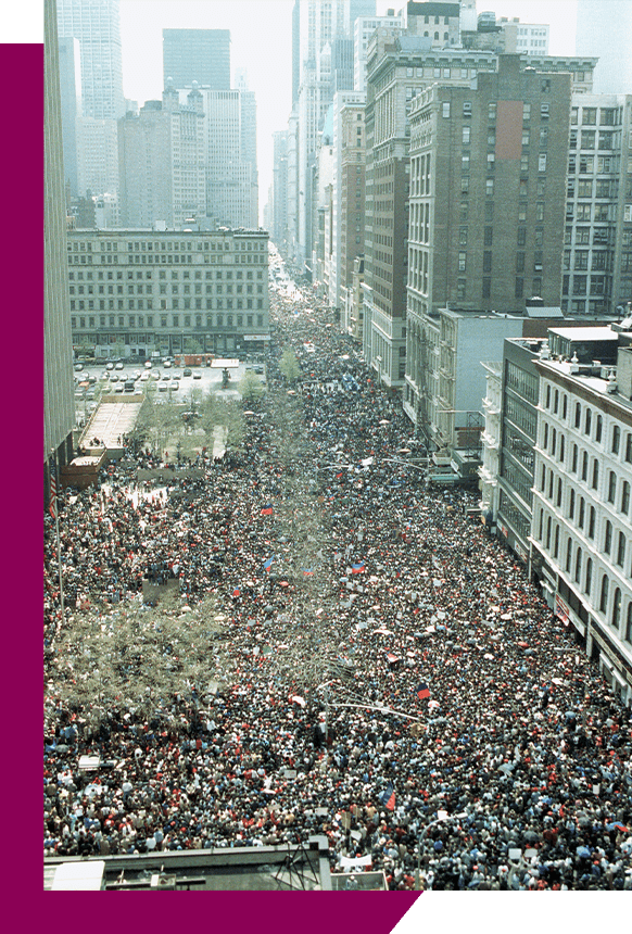 An aerial view of a crowd of thousands of people