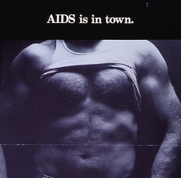 Blue background with white text, except for “AIDS” which is red and has a cut or rip through the bottom quarter of the letters.   