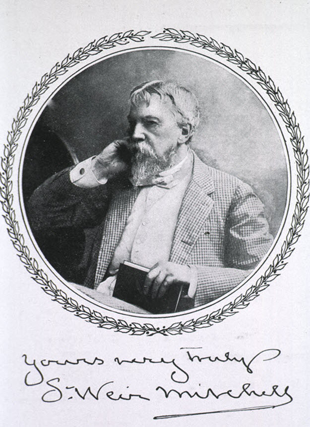 A man seated in profile looking to the left. 