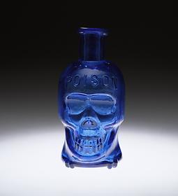 Skull-shaped poison bottle, 19th century