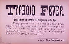 A Board of Health quarantine poster warning that the premises are contaminated by typhoid fever.