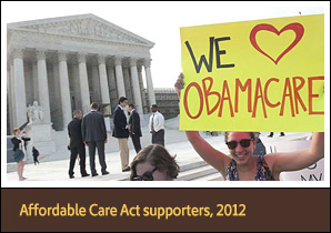Protestor holding sign 'We love Obamacare' with others with Supreme Court in the background.