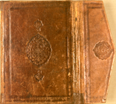 The lower cover and flap of MS A 78 which is a Persian/Turkish binding of the 18th or 19th century has a scalloped mandorla panel stamp with two pendants in the center of each cover. The inner fields of these blind-stamped devices have twisted and tied cloud-ribbon forms with a vine network studded with small flowers and buds. At the very center of the field there appears to be the word 'Ḥasan', the maker's name. A scalloped round medallion is blind-stamped on the envelope flap. Both flap and cover are framed with blind-tooled borders of simple fillets either side of a row of dots.