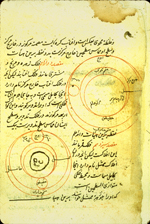 Folio 3b from an anonymous and untitled Persian treatise on astronomy featuring two planetary diagrams in red and black ink in the top right and bottom left corner of the folio. The text surrounding the diagrams is written in a small naskh tending toward ta‘liq script in black ink with headings in red and with red overlinings. The glossy brown paper has only laid lines visible.