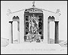 Cross-section of restored temple of Asclepius at Epidaurus, showing a statue of the gad seated on a throne with snakes on and behind the throne.  From: Lechat, Henri. Epidaure, restauration et description des principaux monuments du sanctuaire d'Asclepios (Paris: Libraires-imprimeries réunis, 1895).  NLM Call number: WZ 51 L458e 1895.