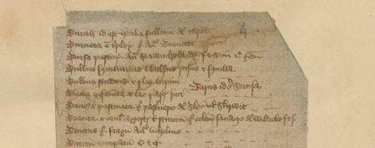 A right hand manuscript page with irregular edges and red ink highlights.