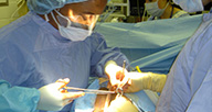 An African American doctor performing surgery