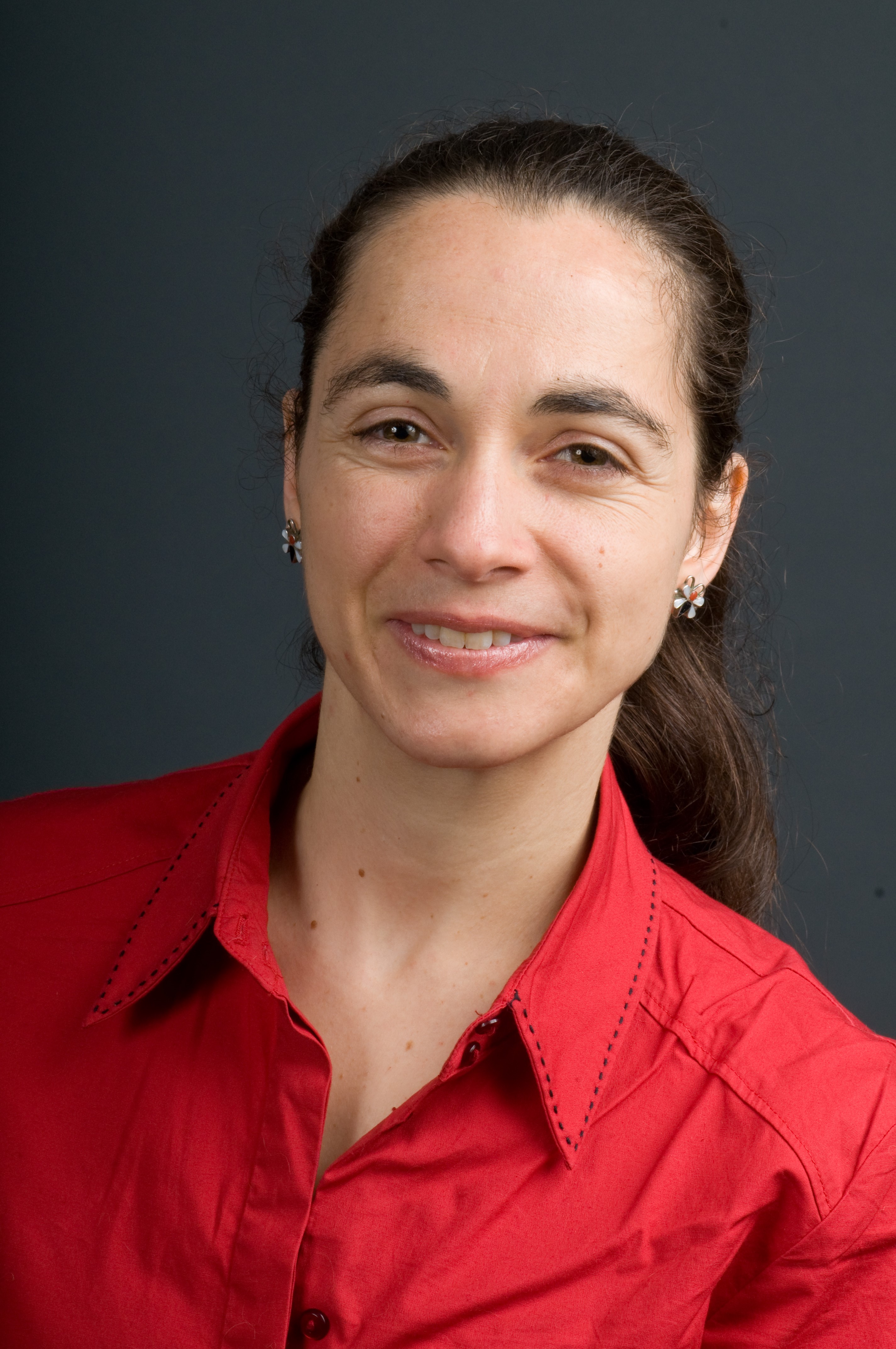 Photograph of a woman wearing a red shirt