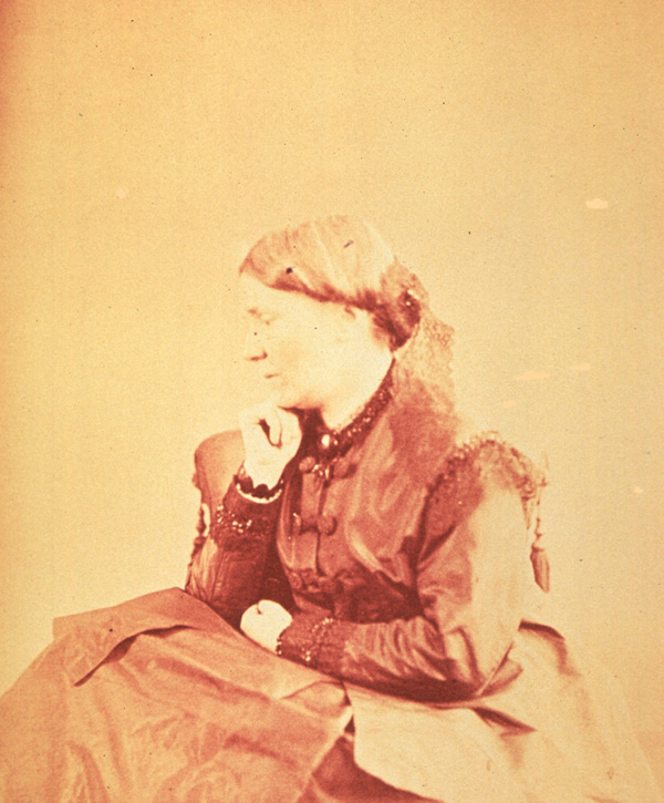  A formal black and white photographic portrait of a white woman.