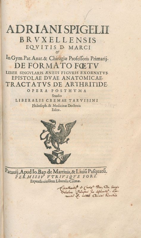 Printed title page with an image of a griffin and a handwritten inscription.