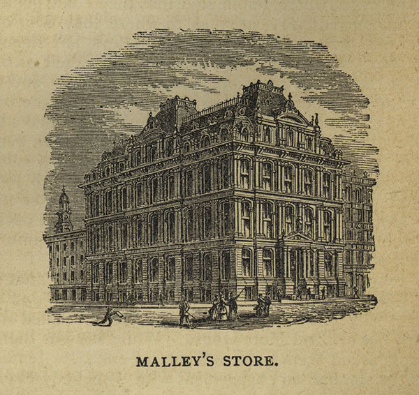 An engraving of Malley’s store building, a large four storey building on a city street corner.