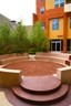 Color image of a large, outdoor, circular seating area.