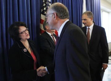 Elouise Cobell Shakes Hands with Interior Secretary Ken Salazar