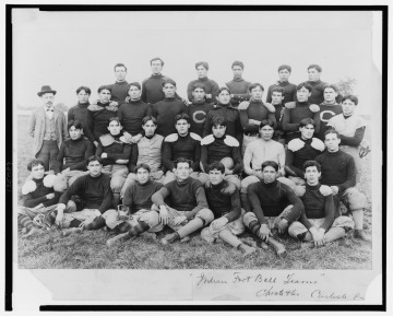 Group portrait of the Carlisle Indian School football team, circa 1899