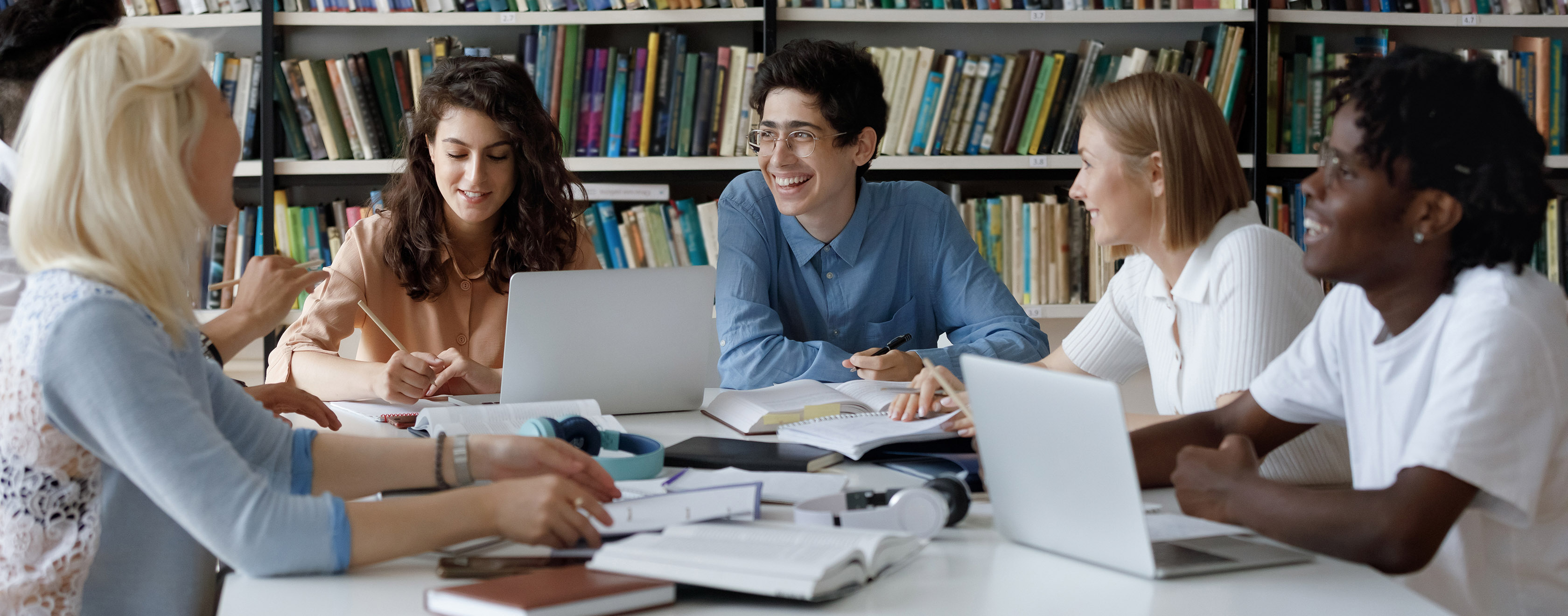 six diverse interns working together